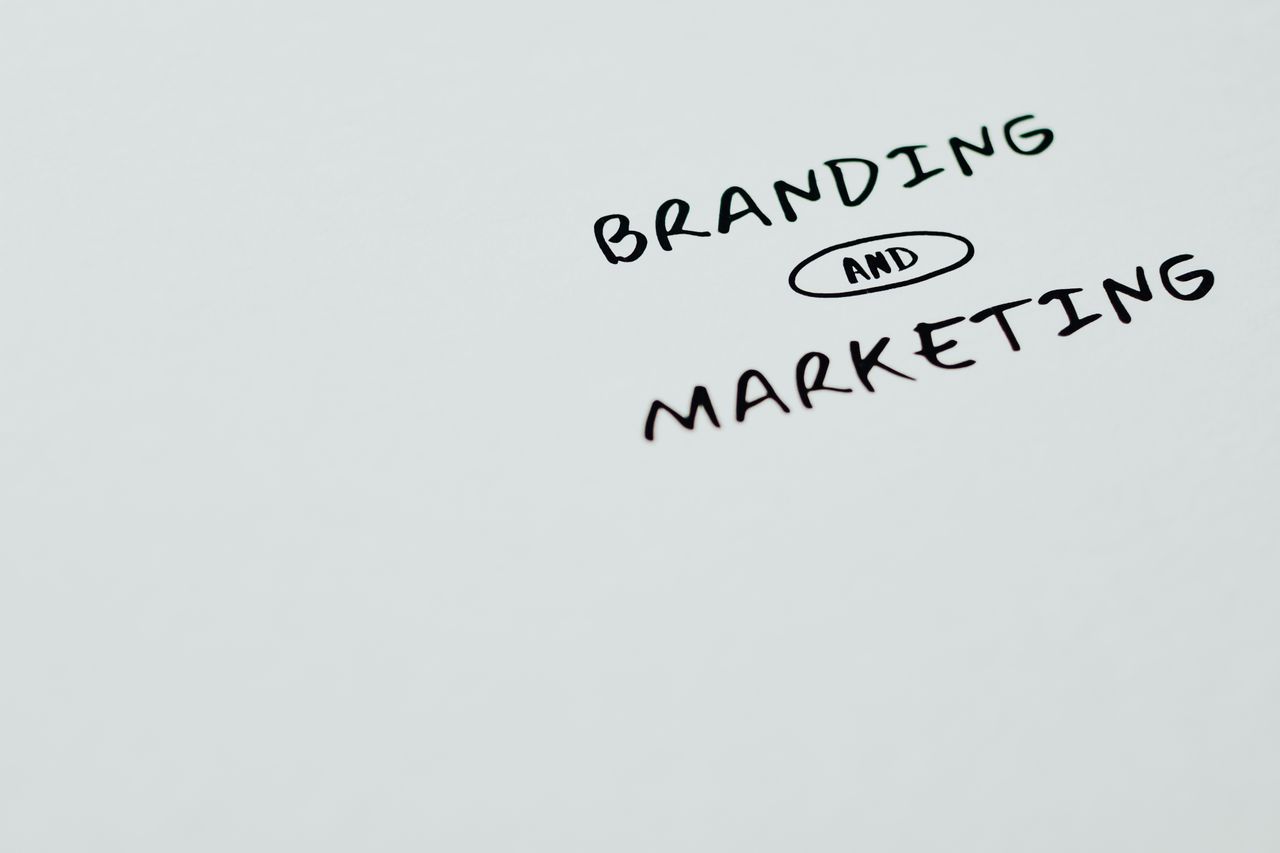 about-us A minimalist image featuring the words Branding and Marketing on a white background, ideal for digital marketing themes.